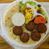 Falafel Plate · Mixture of ground chick peas, fava beans, parsley, onions, other herbs and spices shaped int...