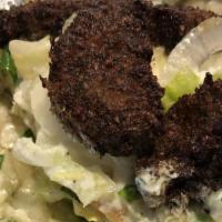 Falafel Sandwich · Mixture of ground peas, fava beans, parsley, onion, many other herbs and spices shaped into ...