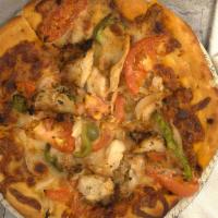 Jaguar Jambalaya Pizza · Shrimp, Italian sausage, crawfish, chicken, green peppers, tomatoes, white onions, and homem...