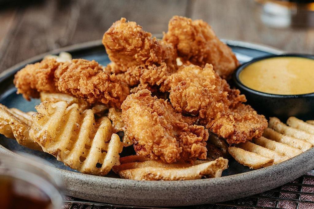 Hand-Breaded Chicken Tenders · All-natural chicken served classic style with honey. mustard dressing.
