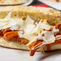 Buffalo Chicken Parm Sub · Breaded and fried chicken cutlet tossed in buffalo sauce and cheese melt on a toasted garlic...