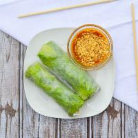 Fresh Roll · Green lettuce, rice noodles, carrots, bell peppers, and fresh herbs rolled in rice paper ser...