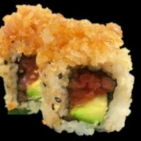 Crunchy Tuna Roll · Spicy tuna and avocado topped with tempura flakes and eel sauce.