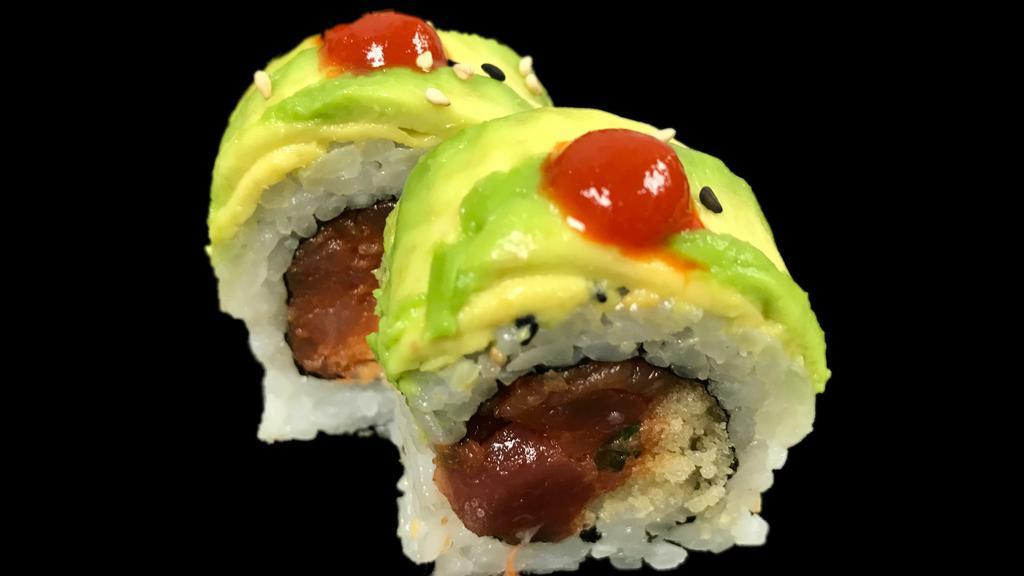 Hurricane Roll · Spicy tuna and tempura flakes topped with avocado and sriracha sauce.