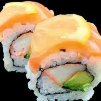 Sunset Roll · Crab stick and avocado topped with salmon and thinly sliced lemon.