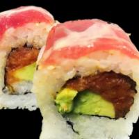 Blossom Roll · Spicy tuna and avocado topped with tuna splashed with wasabi and eel sauce.