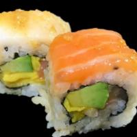 Mango Tango Roll · Yellowtail, mango and avocado topped with white tuna, salmon, eel sauce and ginger dressing.