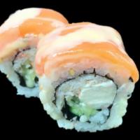 Cesar Roll · Snow crab, ebi shrimp, cucumber and cream cheese topped with salmon and creamy white sauce.
