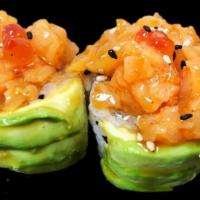 Green Wave Roll · Yellowtail, white fish and tempura flakes wrapped around with avocado topped with chopped sc...