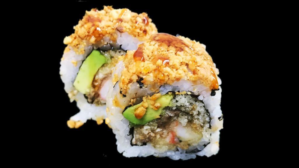 Peanut Crunch Roll · Shrimp tempura, eel, avocado and tempura flakes inside covered with crushed peanuts and eel sauce.