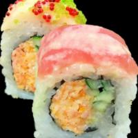 Santa Roll · Spicy crab stick, cucumber and tempura flakes topped with tuna, white tuna, red tobigo, wasa...