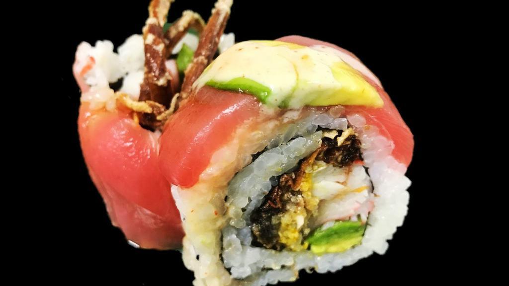 Vegas Roll · Soft shell crab tempura, crab stick and avocado topped with tuna, masago, spicy mayo, wasabi and eel sauce.