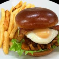 Teriyaki Chicken Burger · Teriyaki pulled chicken, fried egg, lettuce tomato, grilled onions and grilled mushrooms in ...