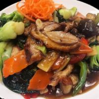 Basil Duck · Crispy boneless duck sautéed with mushrooms, bell peppers, carrots, bamboo shoots, broccoli,...