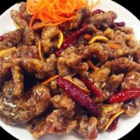 Orange Beef · Crispy beef stir-fried in a sweet and sour orange sauce with scallions and dried chillies.