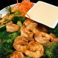 Hibachi Shrimp · Grilled shrimp with broccoli and zucchini in a hibachi sauce.