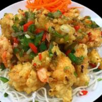 Salt & Pepper Shrimp · Lightly battered jumbo shrimps stir-fried with garlic and onions, seasoned with salt and pep...