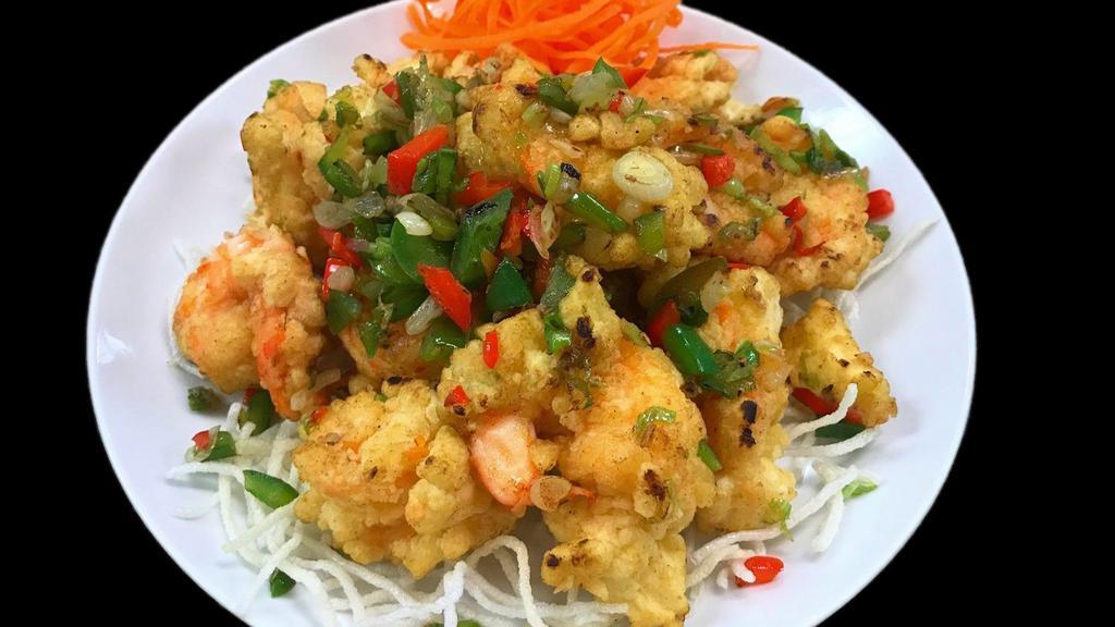 Salt & Pepper Shrimp · Lightly battered jumbo shrimps stir-fried with garlic and onions, seasoned with salt and pepper.
