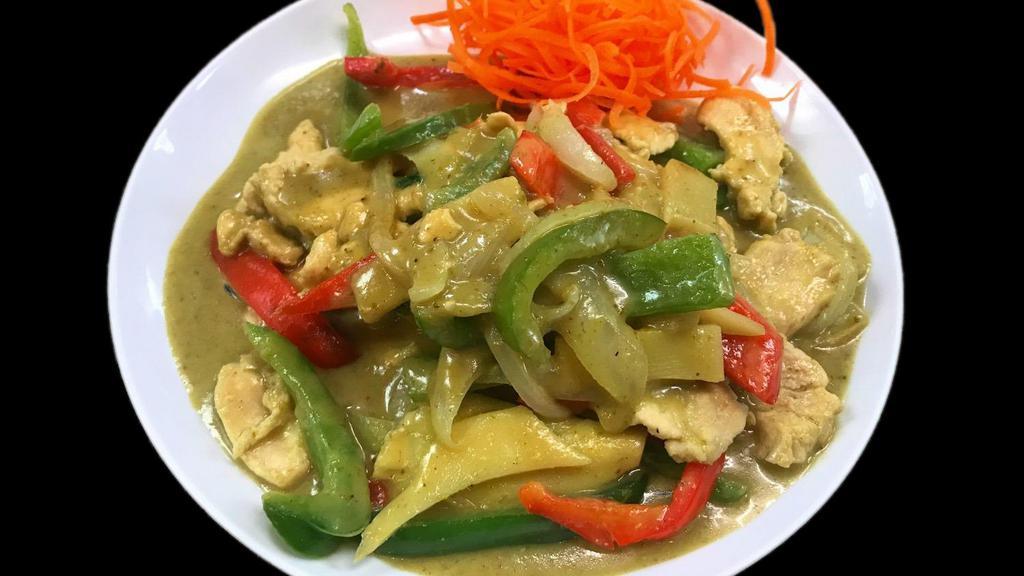 Green Curry · Green curry sauce with bamboo shoots, bell peppers, onions, and basil.