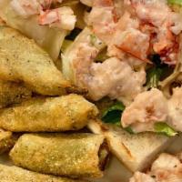 Lobster & Shrimp Roll · Lobster and shrimp salad, lettuce. On a toasted New England style bun served with whole frie...