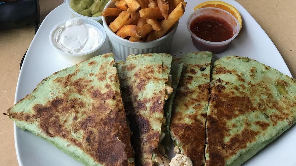 Supreme Quesadilla · Grilled chicken or shrimp. Grilled onions, bell peppers, mushrooms and cheese with sides of guacamole, salsa, sour cream, queso and chips.