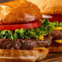 Quitutes Classic Burger · Our signature tasty original 1/2 lb housemade patty with 2 slices of cheddar cheese, quitute...
