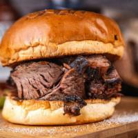 Smoked Brisket Burger · Savor of the rich flavor in this tasty original, an all brisket slow-smoked patty with 2 sli...