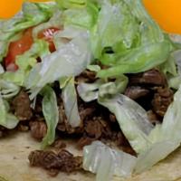 Beef Taco · Traditional soft shell favorite.  Served with lettuce, tomatoe and onion. GROUND BEEF ONLY.
