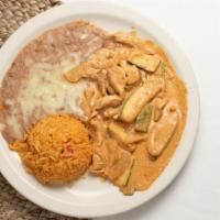 Pollo Chipotle #56 · Sliced chicken breast, zucchini, and onions cooked in a creamy chipotle sauce. Served with r...