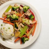 Pollo Vegetales · Marinated slices of chicken breast cooked with broccoli, carrots, celery, red bell pepper, p...