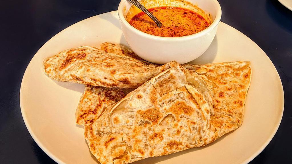 Roti Canai (Indian Pancake) · Favorite Malaysian Indian style pancakes, served with curry sauce.