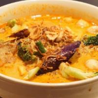 Curry Laksa · Hot and spicy. Indian yellow curry soup style noodle bowl with both thin rice vermicelli and...