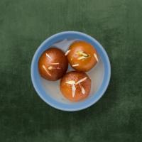 Gulab Jamun  · Four pieces. Soft delicious berry-sized treats made of milk solids, fried and steeped in a r...