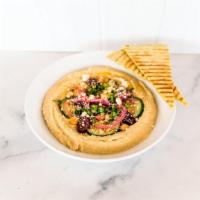 Mediterranean Hummus · house-made hummus, cucumbers, olives, pickled red onions, feta, scallion mix, and grilled sp...