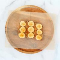 Single Almond Butter Toast · almond butter, banana, flax seeds, honey, sprouted bread
