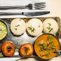 Idli & Vada Platter · Vegan. Gluten-free. Rice and lentils steamed dumplings. Served with sambar and coconut chutn...