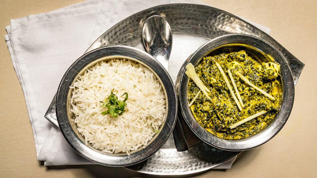 Palak Paneer · Gluten-free. Homemade Indian cheese cooked with spinach and mild spices. Served with choice of rice.