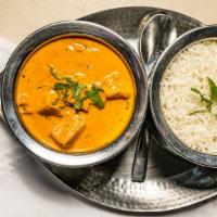 Tikka Masala · Top menu item. Gluten-free. Cooked in tandoor then mixed in our special creamy tomato sauce....