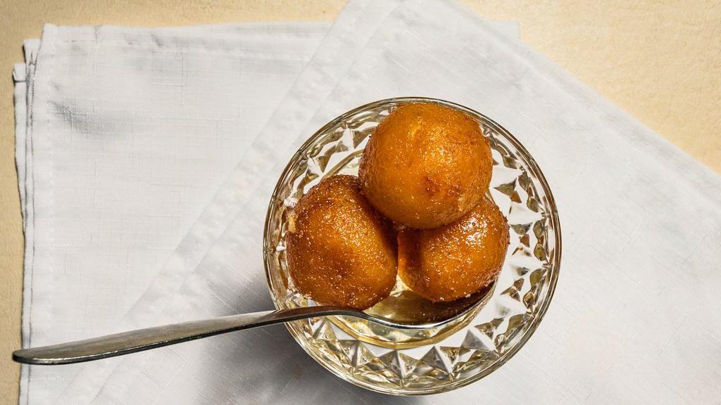 Gulab Jamun · Gluten-free. Homemade golden fried cheese balls soaked in sugar syrup.