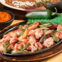 -Fajita De Camaron · Shrimp, chile pepper, tomato, onion. Served with rice and beans lettuce, sour cream, guacamo...