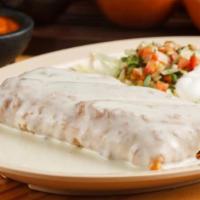 Chimichanga · A large flour tortilla filled with shredded chicken, refried beans, cheese, salsa and spices...