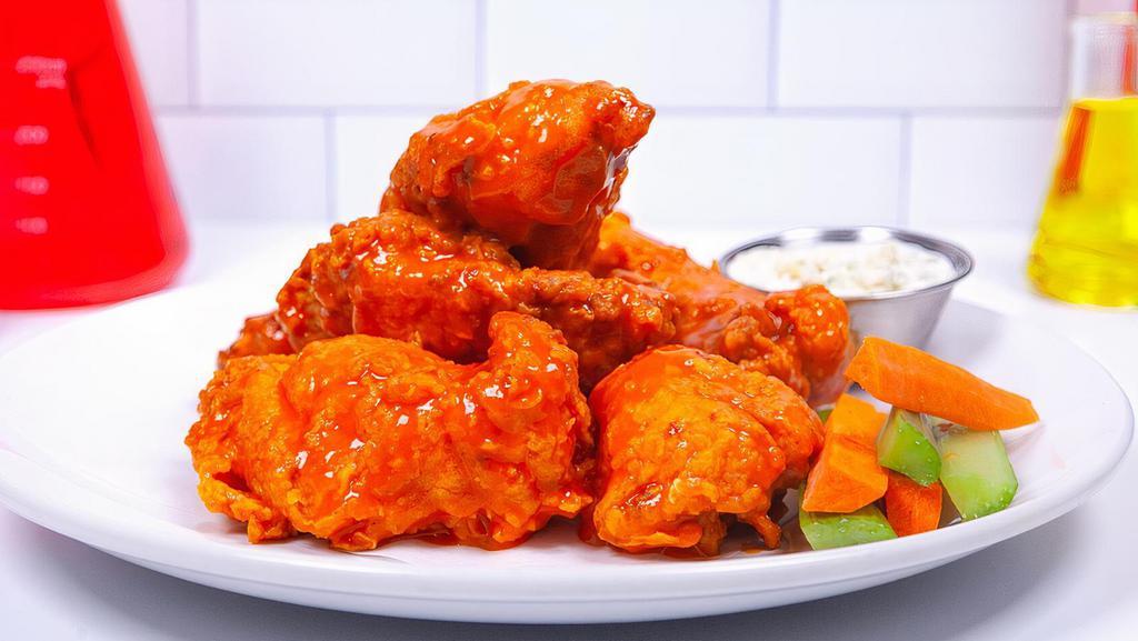 Big Bang Buffalo · Our team of scientists have officially conquered the world's greatest Buffalo Wing recipe!  Eureka!

Hand-battered wings tossed in a homemade Buffalo sauce. Yum. Yum and Yum.