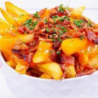 Einstein Fries · Fries topped with cheddar and crispy bacon.