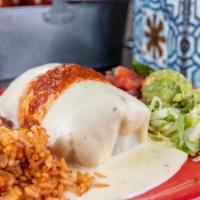 Beer-Braised Pork Burrito · Stuffed with pork, mexican rice, onions, and sweet red and yellow bell peppers topped with q...