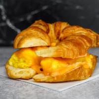 Croissant, Egg, & Cheese Sandwich · 2 scrambled eggs, melted cheese, and Sriracha aioli on a warm croissant.