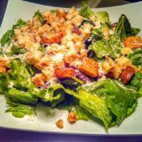 Caesar Salad · Romaine lettuce, parmesan cheese, croutons & caesar dressing on the side.