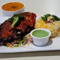 Tandoori Pomfret · Pomfret fish Marinated  and  Grilled in Tandoori Oven. Comes with Mint Chutney.