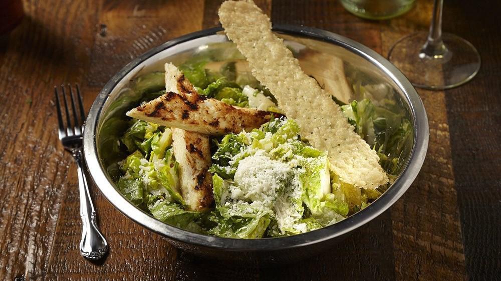Caesar Salad · Romaine, Caesar dressing, shredded parmesan cheese and croutons