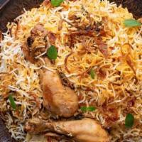 Chicken Biryani · Biryani is a spiced mix of meat and rice, traditionally cooked over an open fire in a leathe...