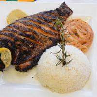 Grilled Fish  · Grilled fish. grilled tilapia fish marinated and saute onion sauce side of your choice.